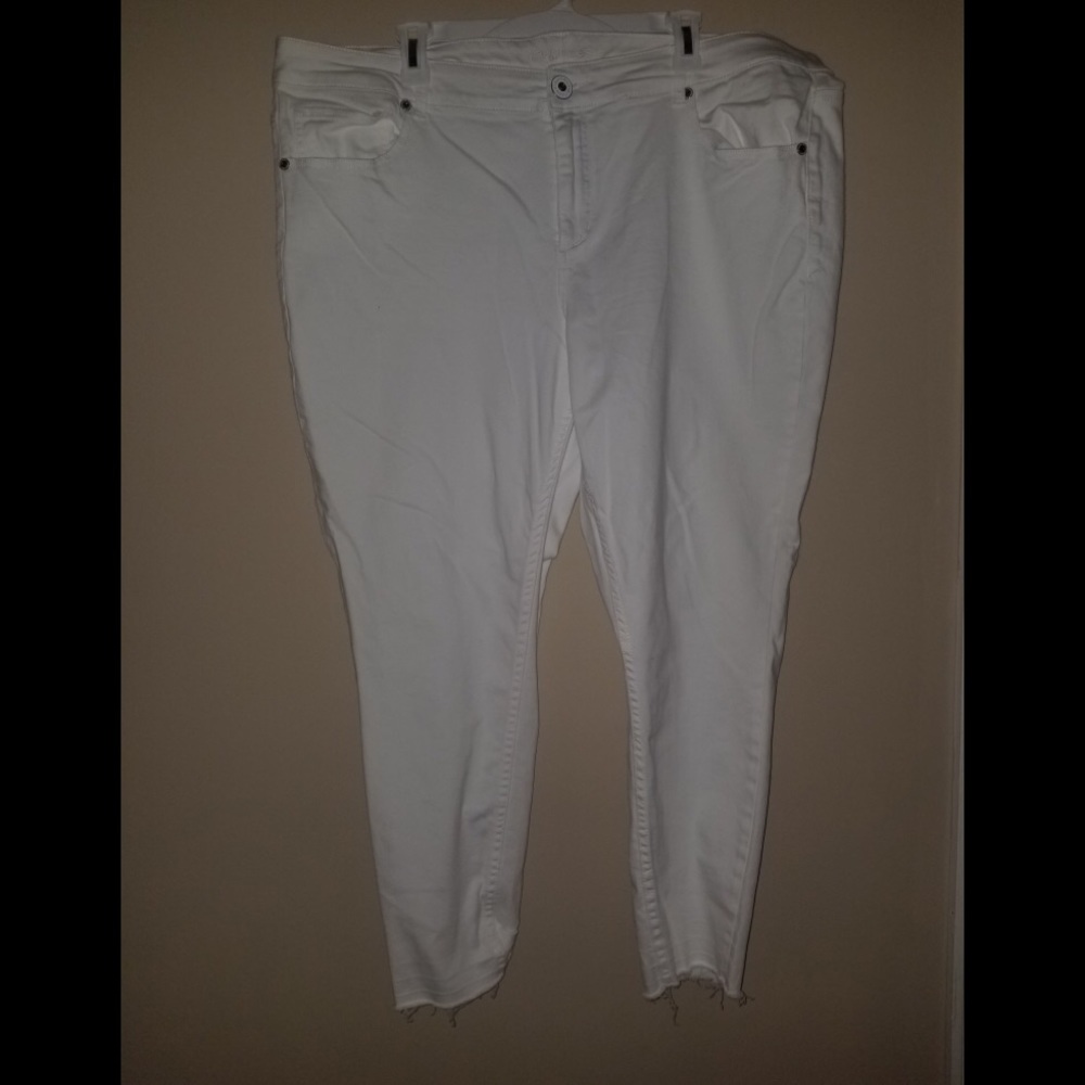 White ankle cropped jeans.